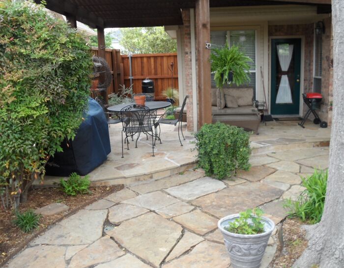A custom flagstone patio that we built