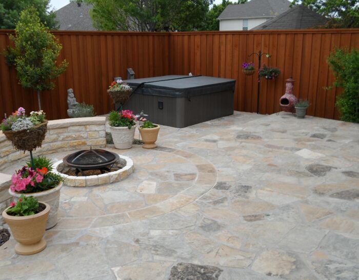 A custom flagstone patio and fireplace that we built