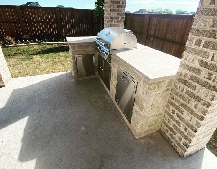 A custom outdoor kitchen and grill that we built