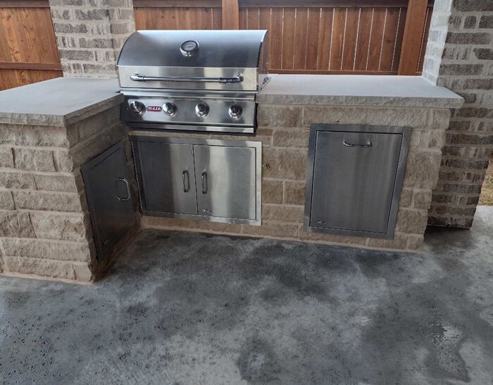 A custom outdoor kitchen and grill that we built